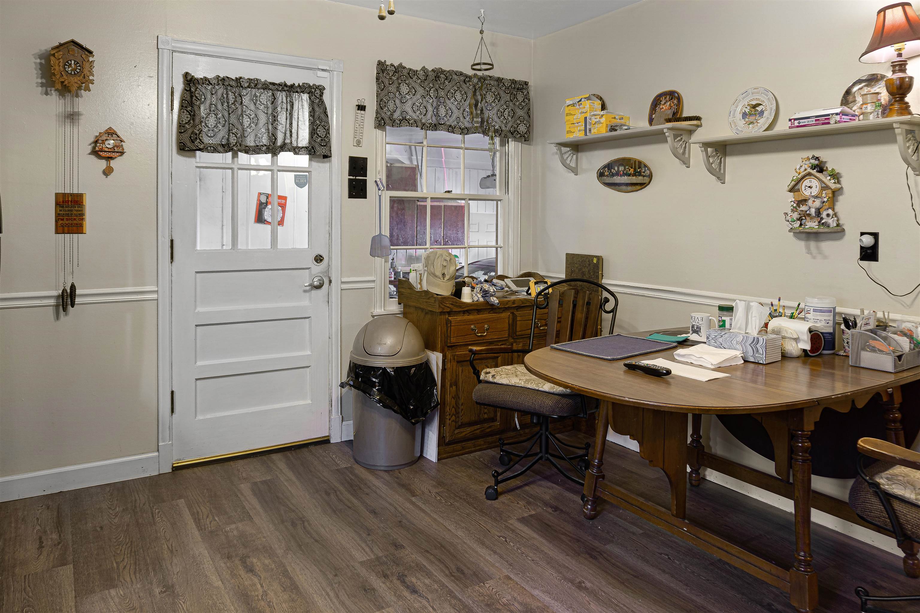 4508 Yale Road Memphis, TN 38128 - Photo 7 of 19 a view of a dining room with furniture and wooden floor