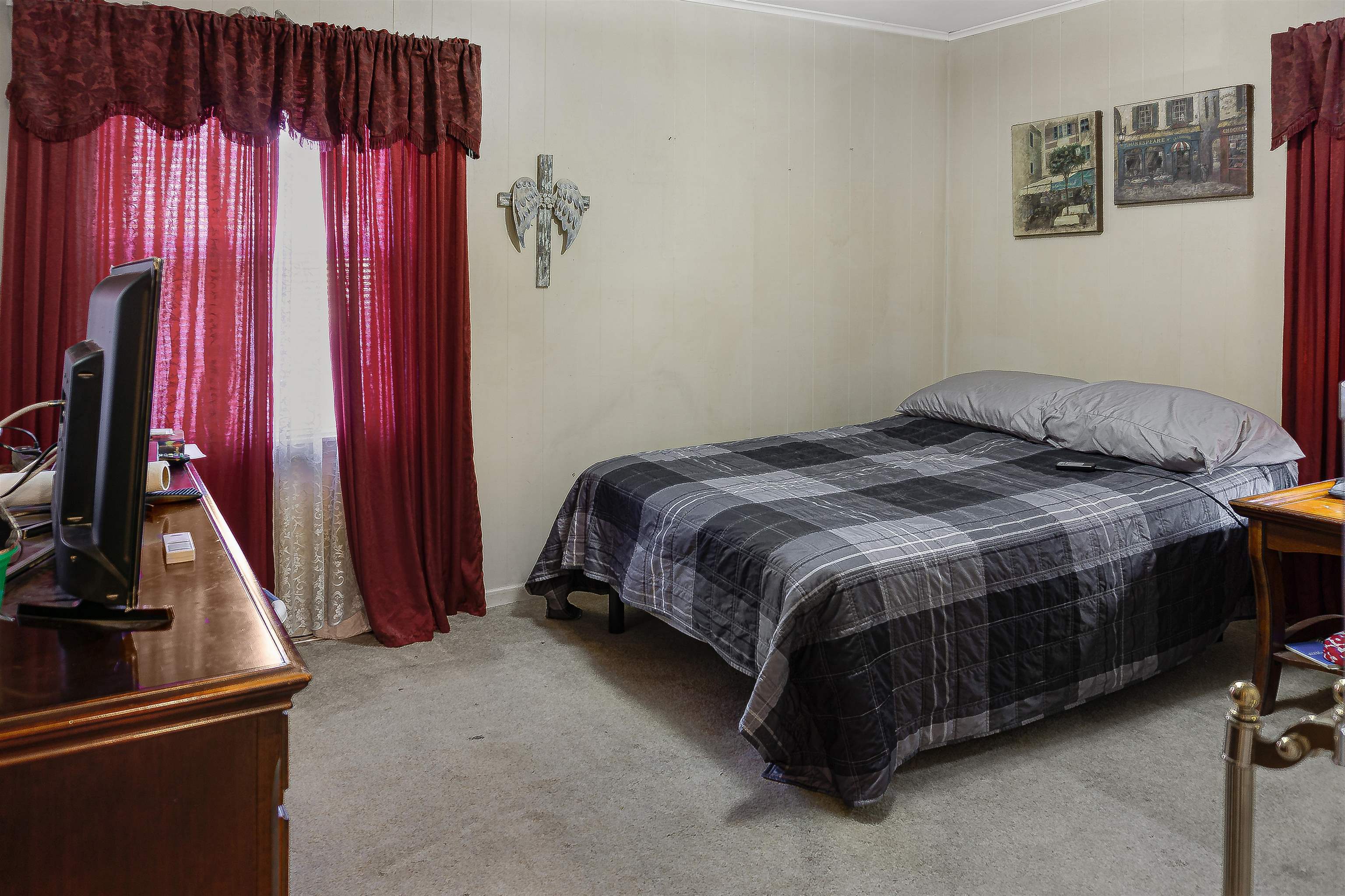 4508 Yale Road Memphis, TN 38128 - Photo 8 of 19 a bed sitting in a bedroom next to a window