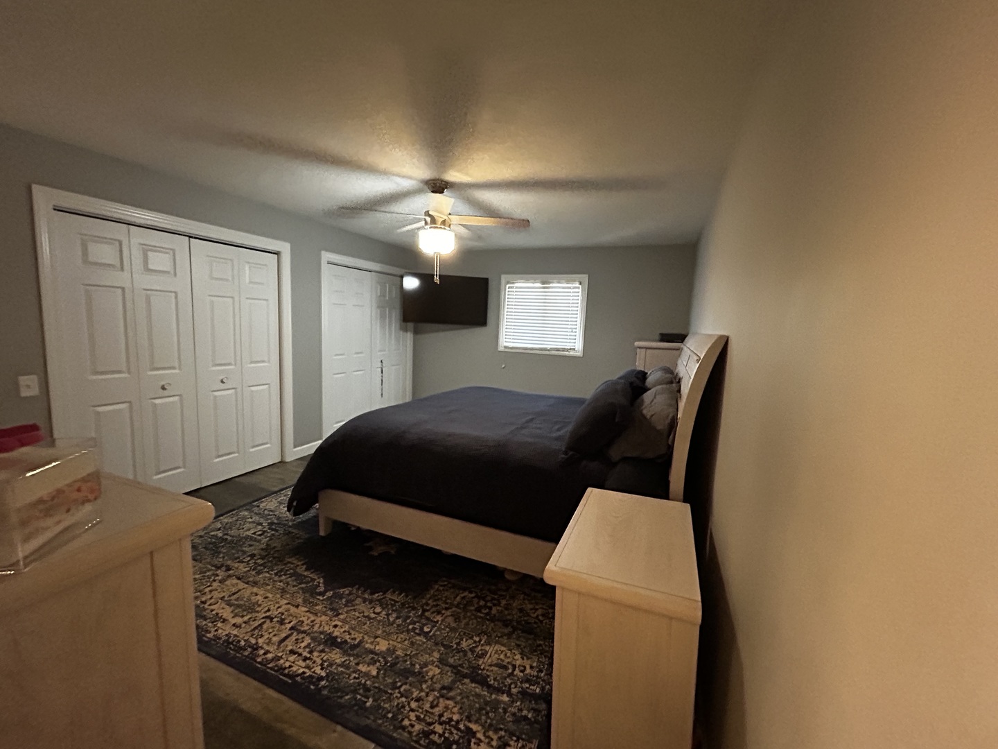 12795 Lawrence Road Sterling, IL 61081 - Photo 24 of 42 a bedroom with a bed and a chandelier