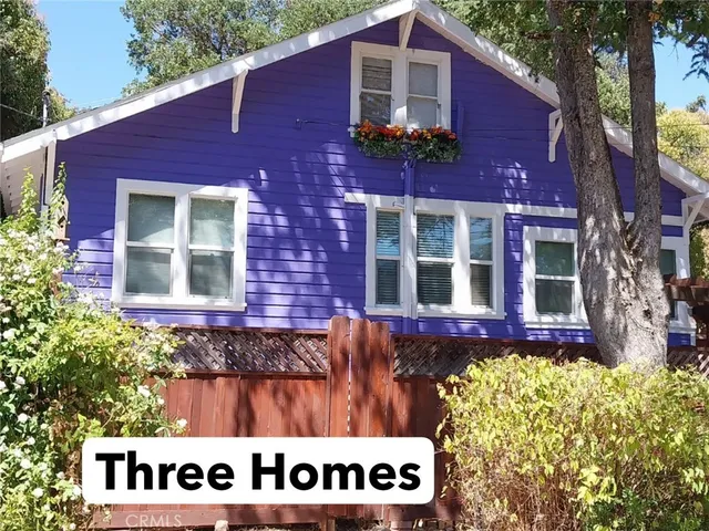 a view of a brick building with large windows