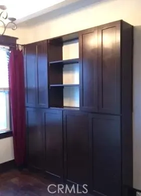 a bathroom with a sink toilet and a mirror