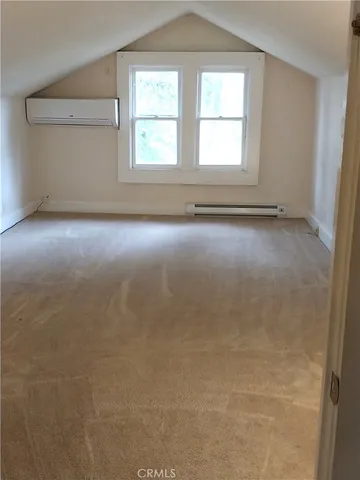 a bathroom with a sink vanity and a mirror