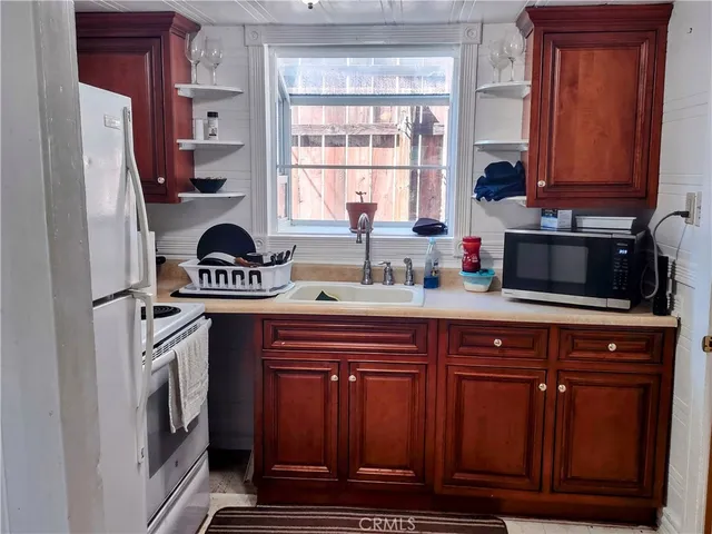 a view of backyard with green space