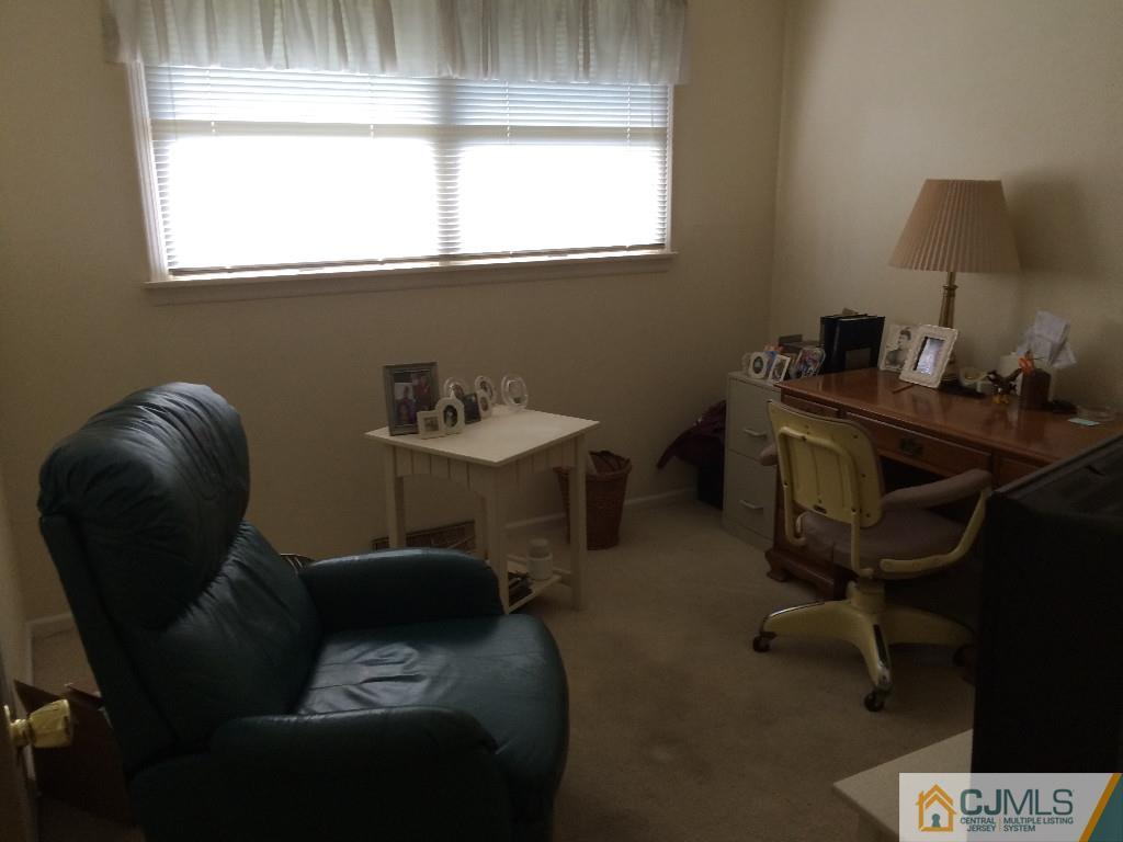 10 Carpender Road New Brunswick, NJ 08901 - Photo 17 of 25 a living room with furniture and a window