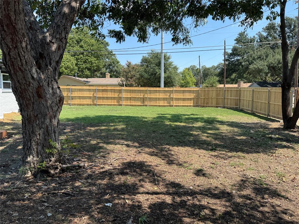 501 Cambridge Drive Richardson, TX 75080 - Photo 31 of 35 a view of backyard with green space