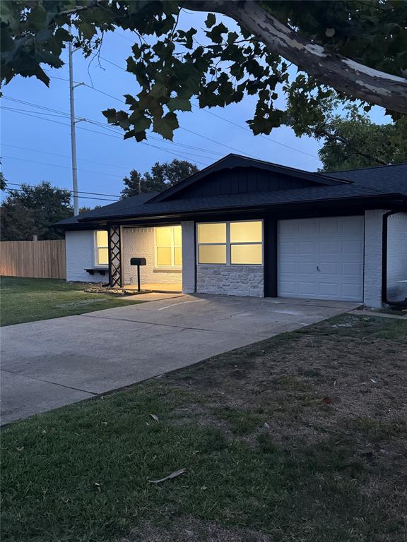 501 Cambridge Drive Richardson, TX 75080 - Photo 7 of 35 a house view with a garden space