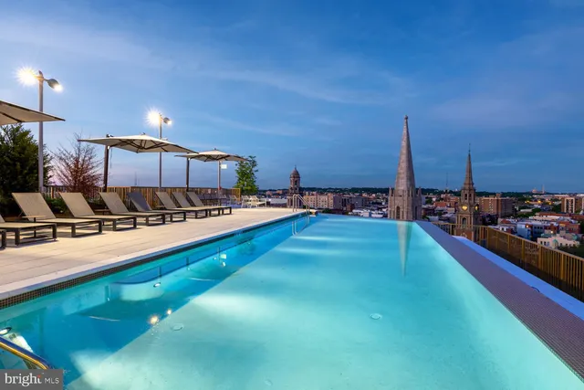 a view of a balcony with chairs