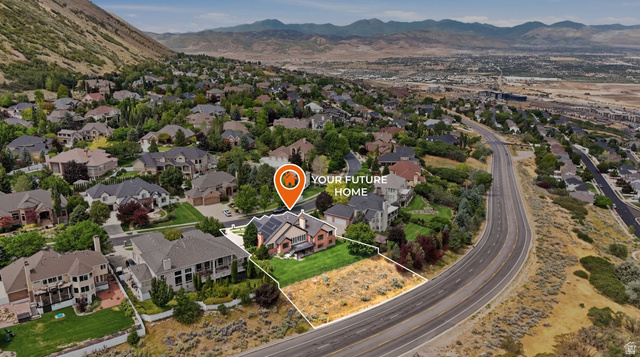 767 Draper View Road Draper, UT 84020 - Photo 67 of 71 Expansive property featuring a two-story residence with a brick exterior, a manicured lawn, and solar panels