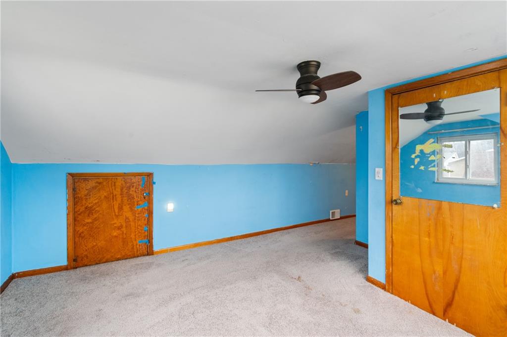 49 Gordon Street McKees Rocks, PA 15136 - Photo 20 of 27 an empty room with windows & cabinet