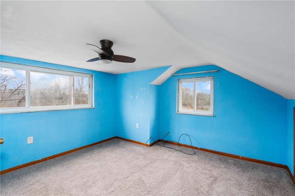 49 Gordon Street McKees Rocks, PA 15136 - Photo 21 of 27 a view of an empty room with window and cabinet