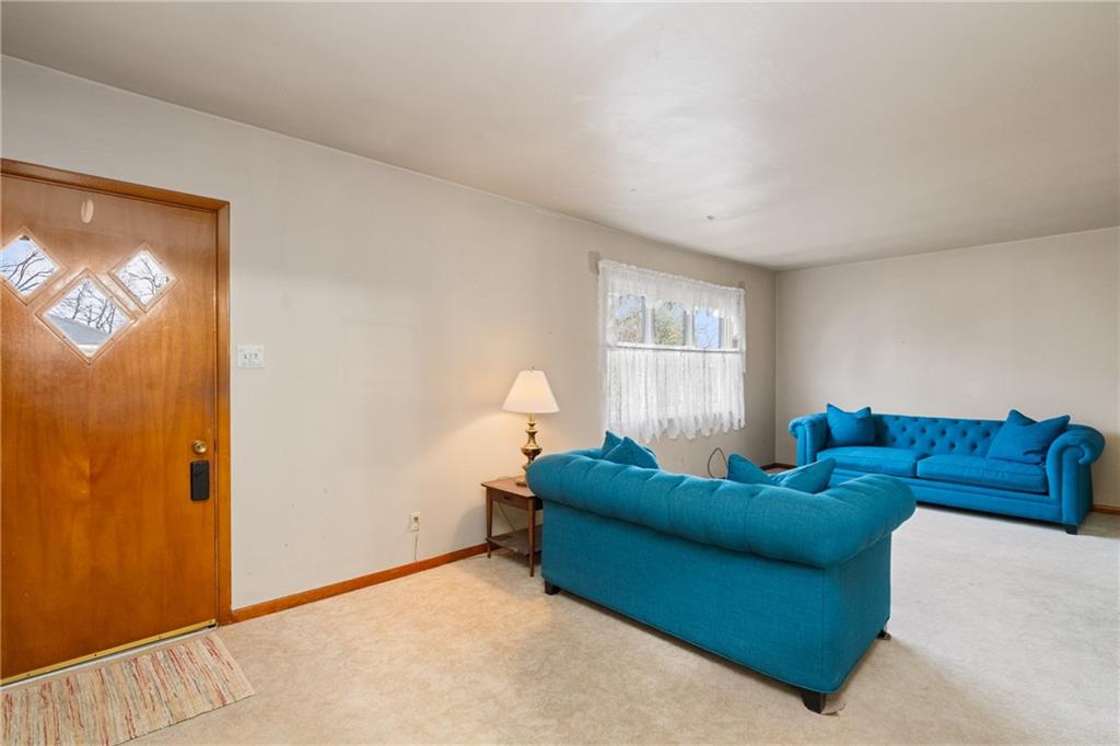 49 Gordon Street McKees Rocks, PA 15136 - Photo 4 of 27 a living room with furniture and a window
