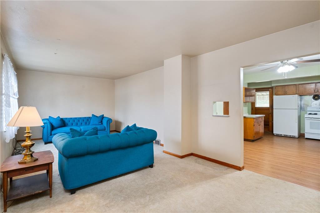 49 Gordon Street McKees Rocks, PA 15136 - Photo 6 of 27 a living room with furniture and a window