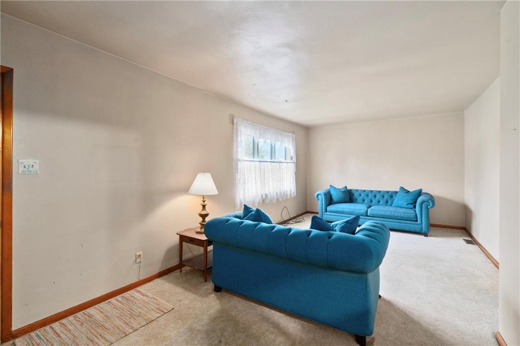 49 Gordon Street McKees Rocks, PA 15136 - Photo 8 of 27 a living room with furniture and a window