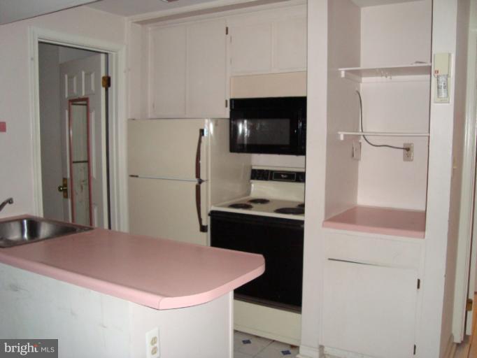 9224 Ispahan Loop Laurel, MD 20708 - Photo 2 of 9 Lower Level Kitchen