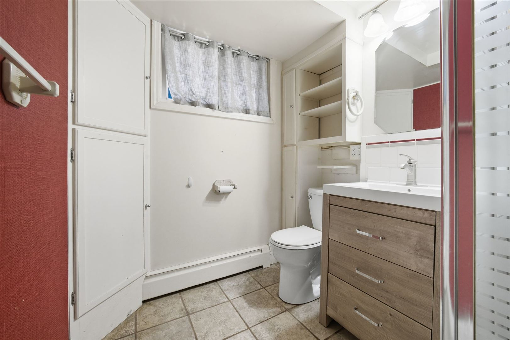 402 Bradley Lane Normal, IL 61761 - Photo 15 of 24 a bathroom with a sink and a toilet