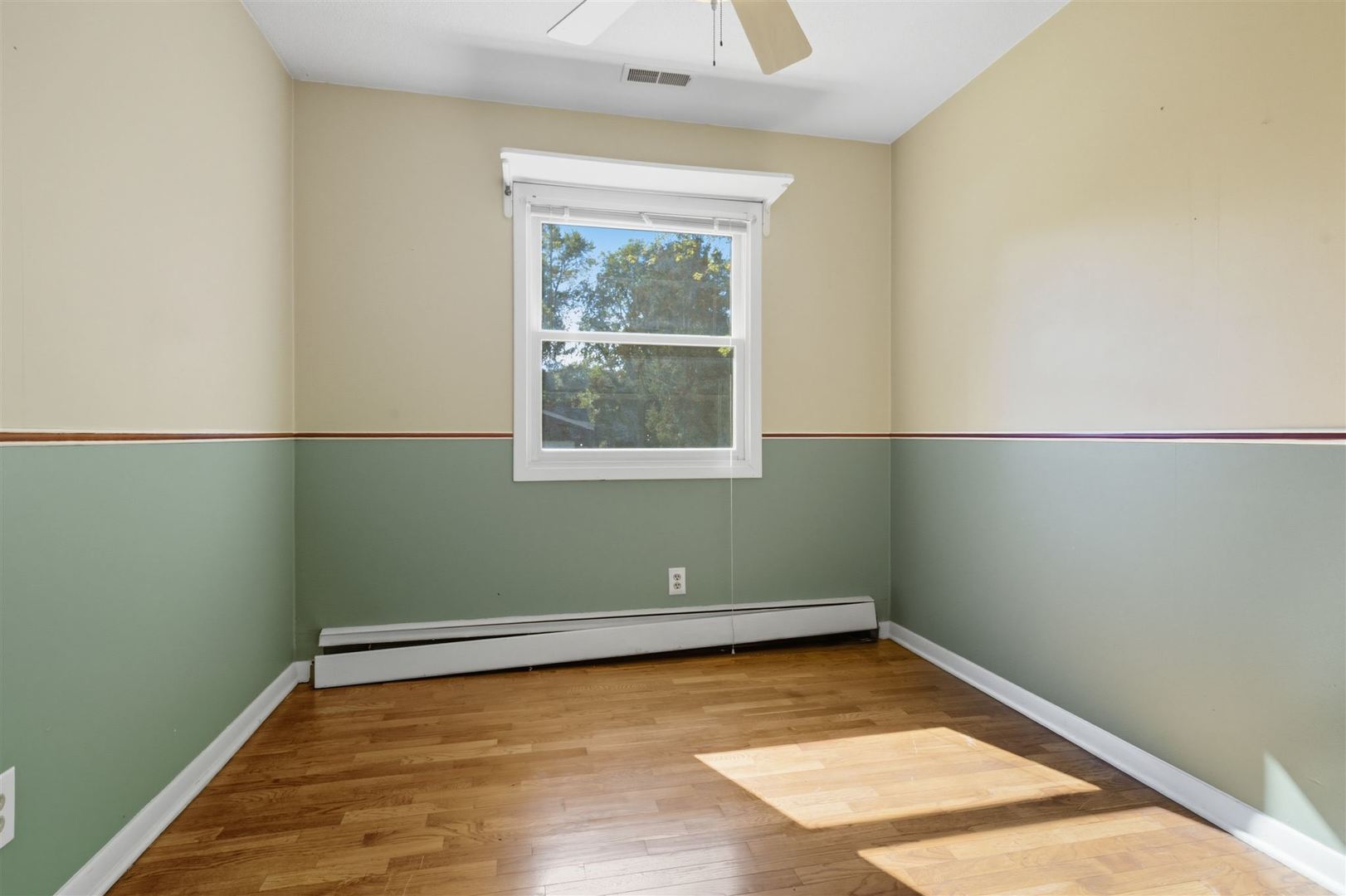 402 Bradley Lane Normal, IL 61761 - Photo 20 of 24 an empty room with a window
