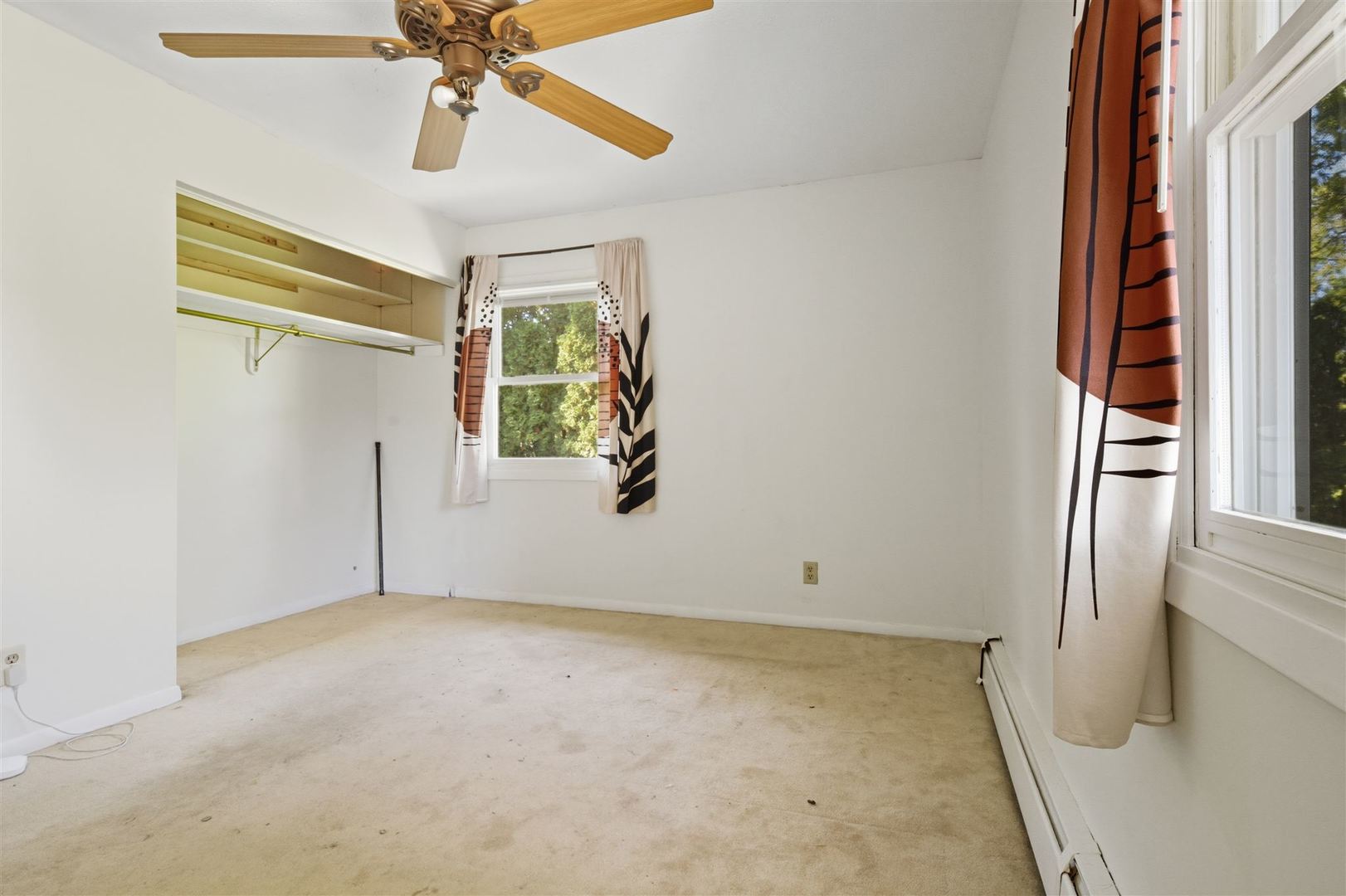 402 Bradley Lane Normal, IL 61761 - Photo 22 of 24 a view of room with window and ceiling fan