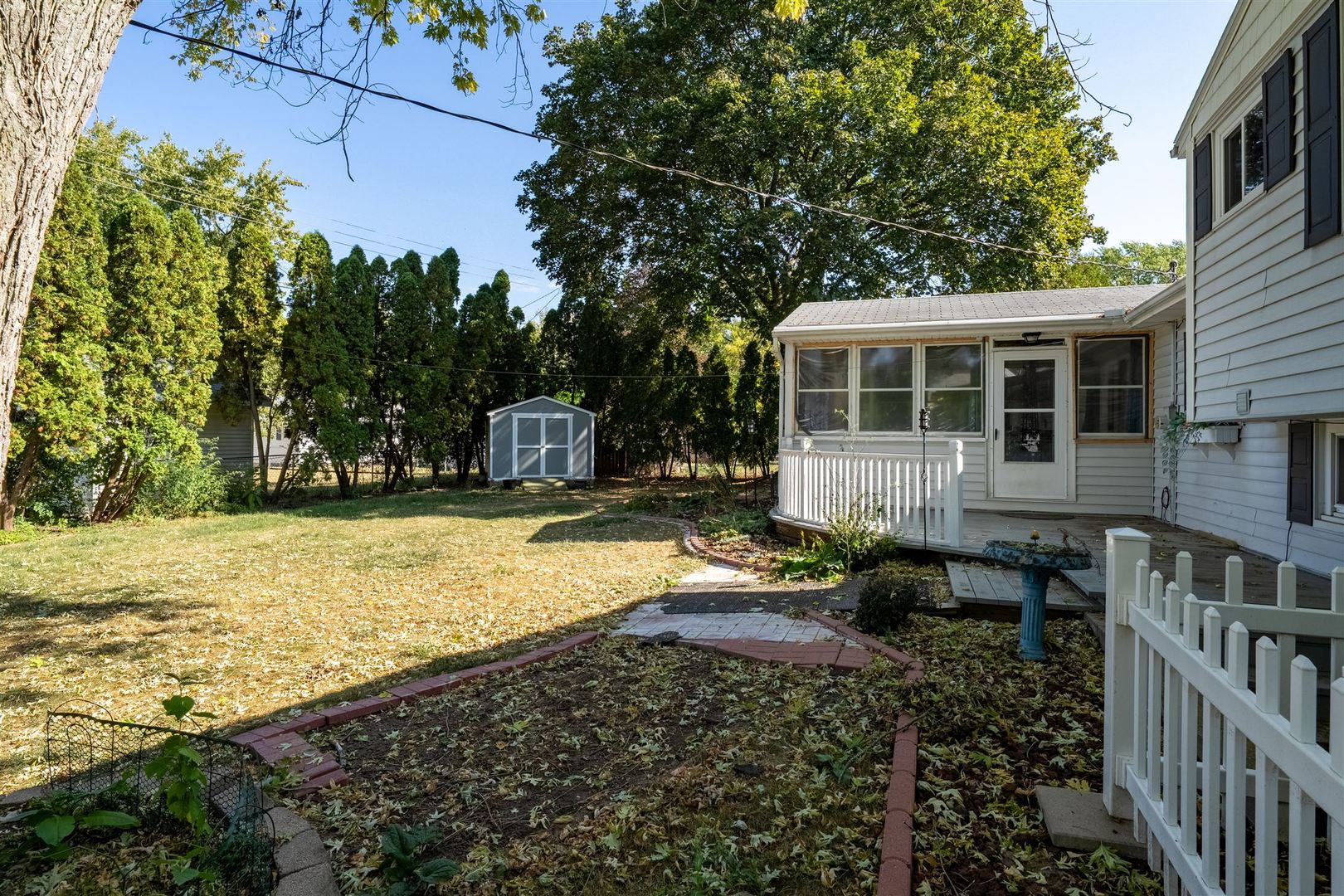 402 Bradley Lane Normal, IL 61761 - Photo 6 of 24 a view of a house with backyard and sitting area