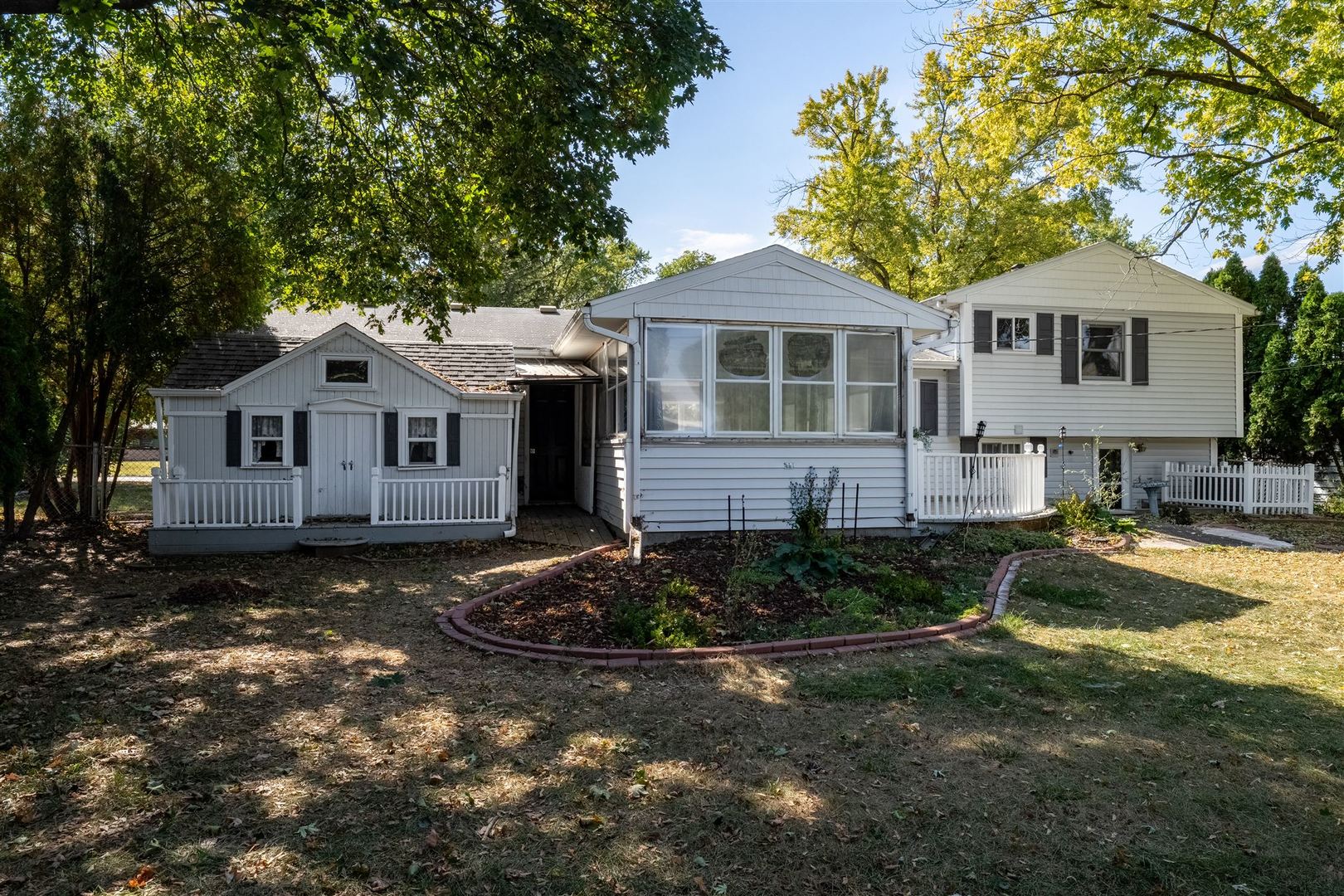 402 Bradley Lane Normal, IL 61761 - Photo 8 of 24 a front view of a house with a yard