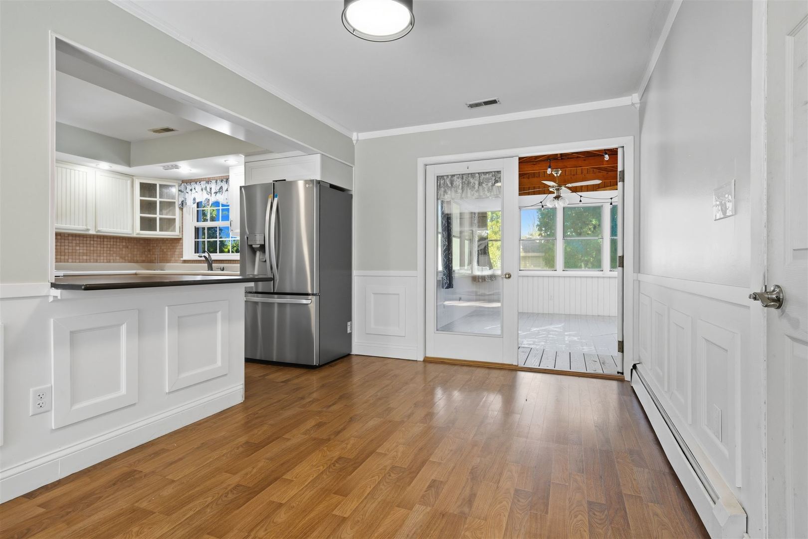 402 Bradley Lane Normal, IL 61761 - Photo 10 of 24 a kitchen with a refrigerator and a sink