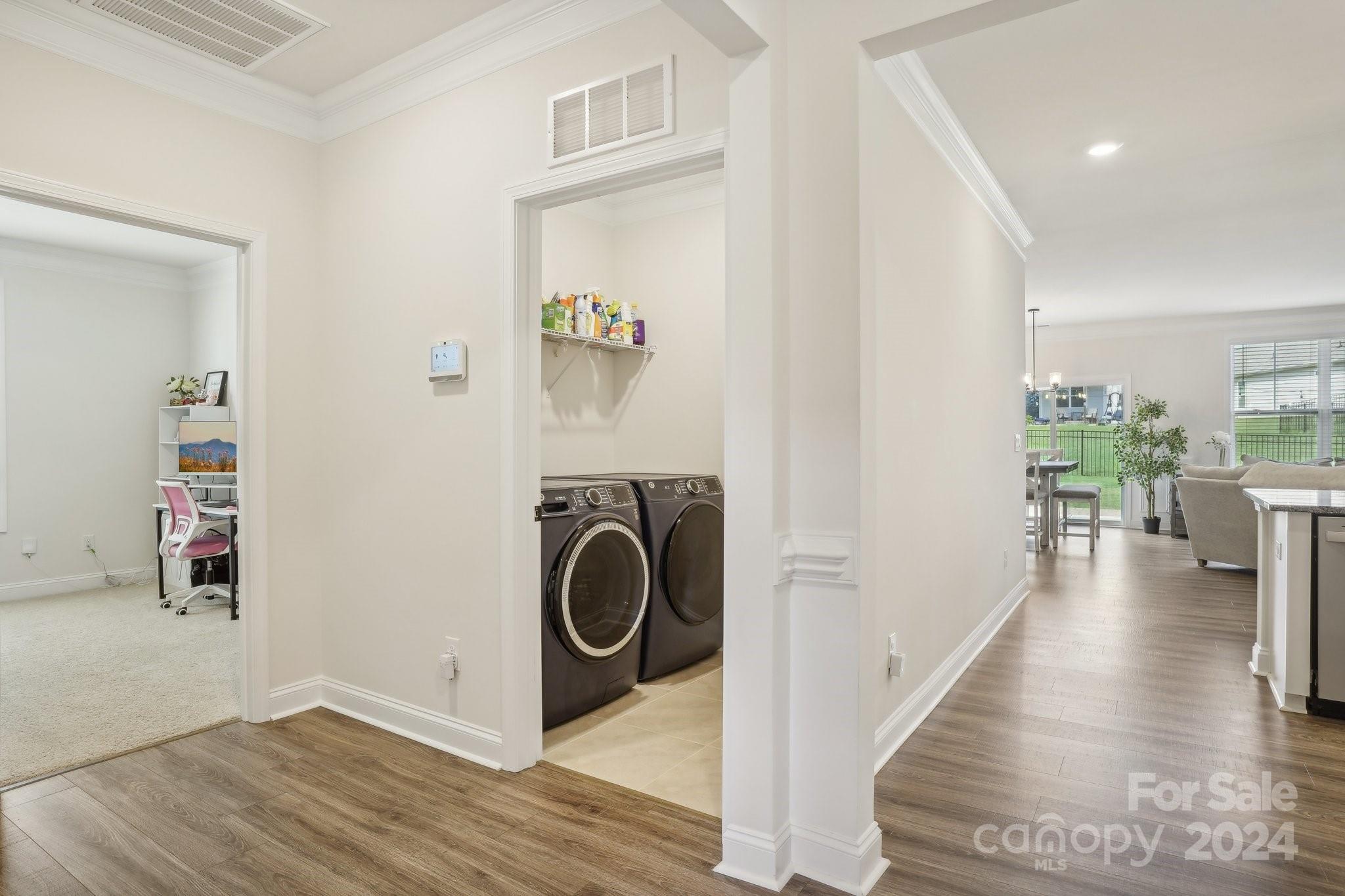 4203 Millstream Road Denver, NC 28037 - Photo 17 of 31 a view of a hallway with washer and dryer
