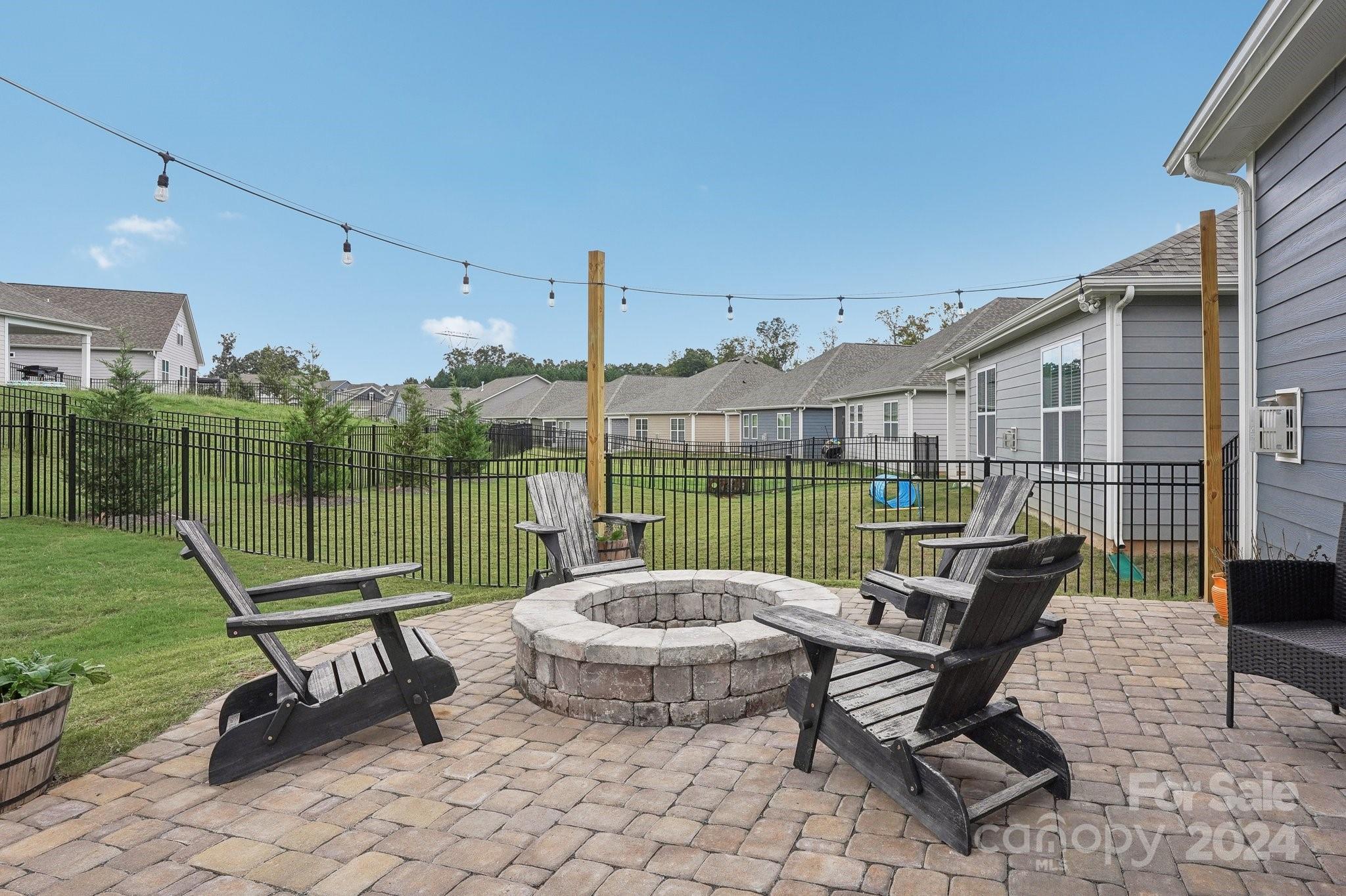 4203 Millstream Road Denver, NC 28037 - Photo 20 of 31 a building outdoor space with patio furniture and garden