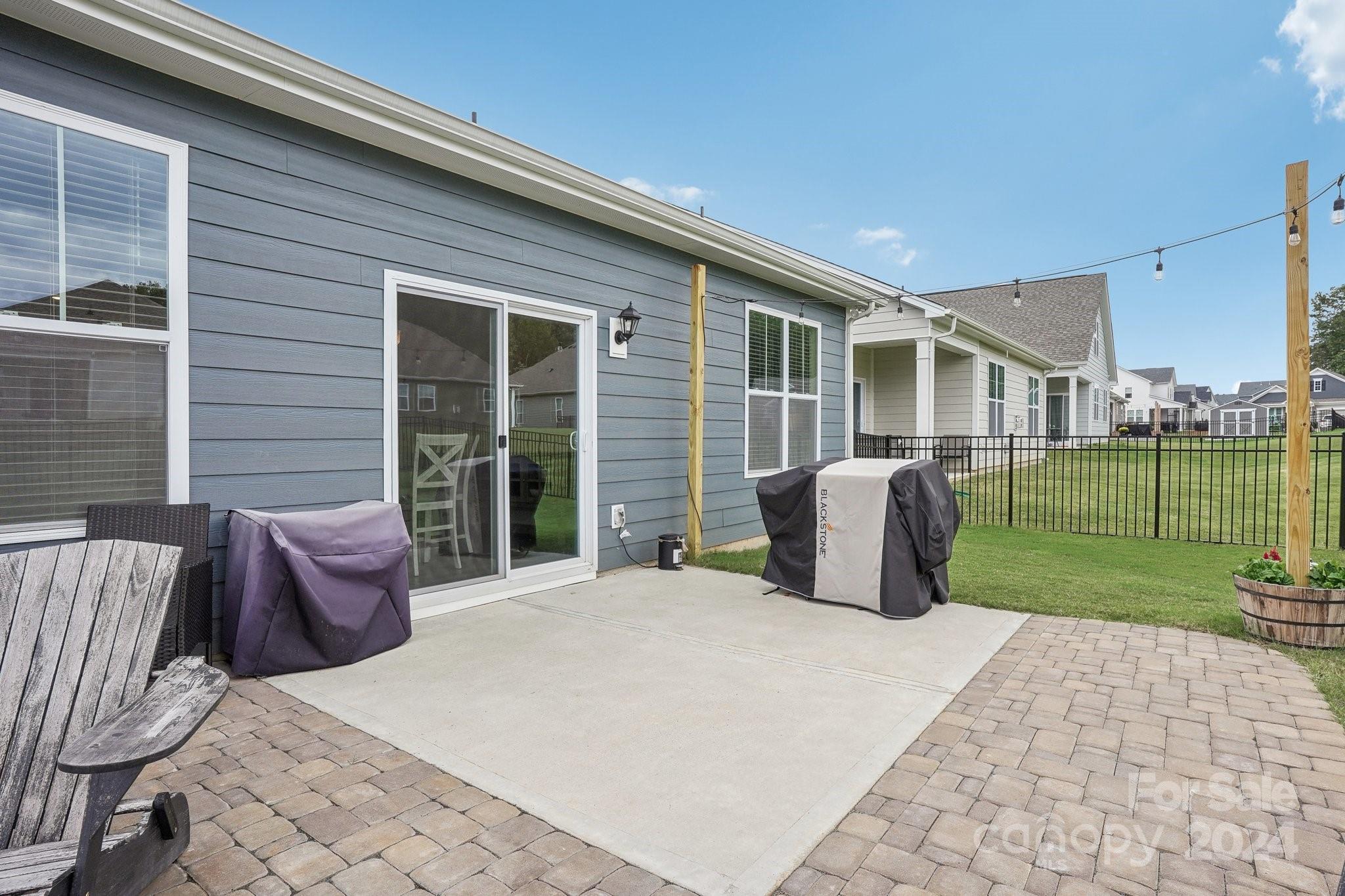4203 Millstream Road Denver, NC 28037 - Photo 21 of 31 a large house with a garden space