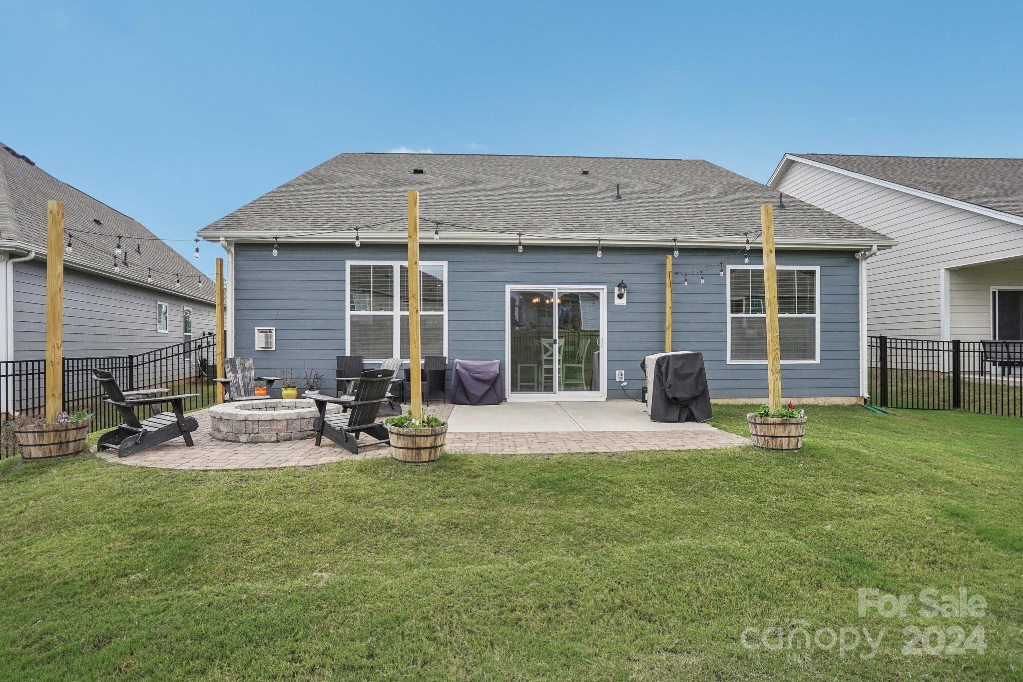 4203 Millstream Road Denver, NC 28037 - Photo 22 of 31 a house view with a sitting space and garden