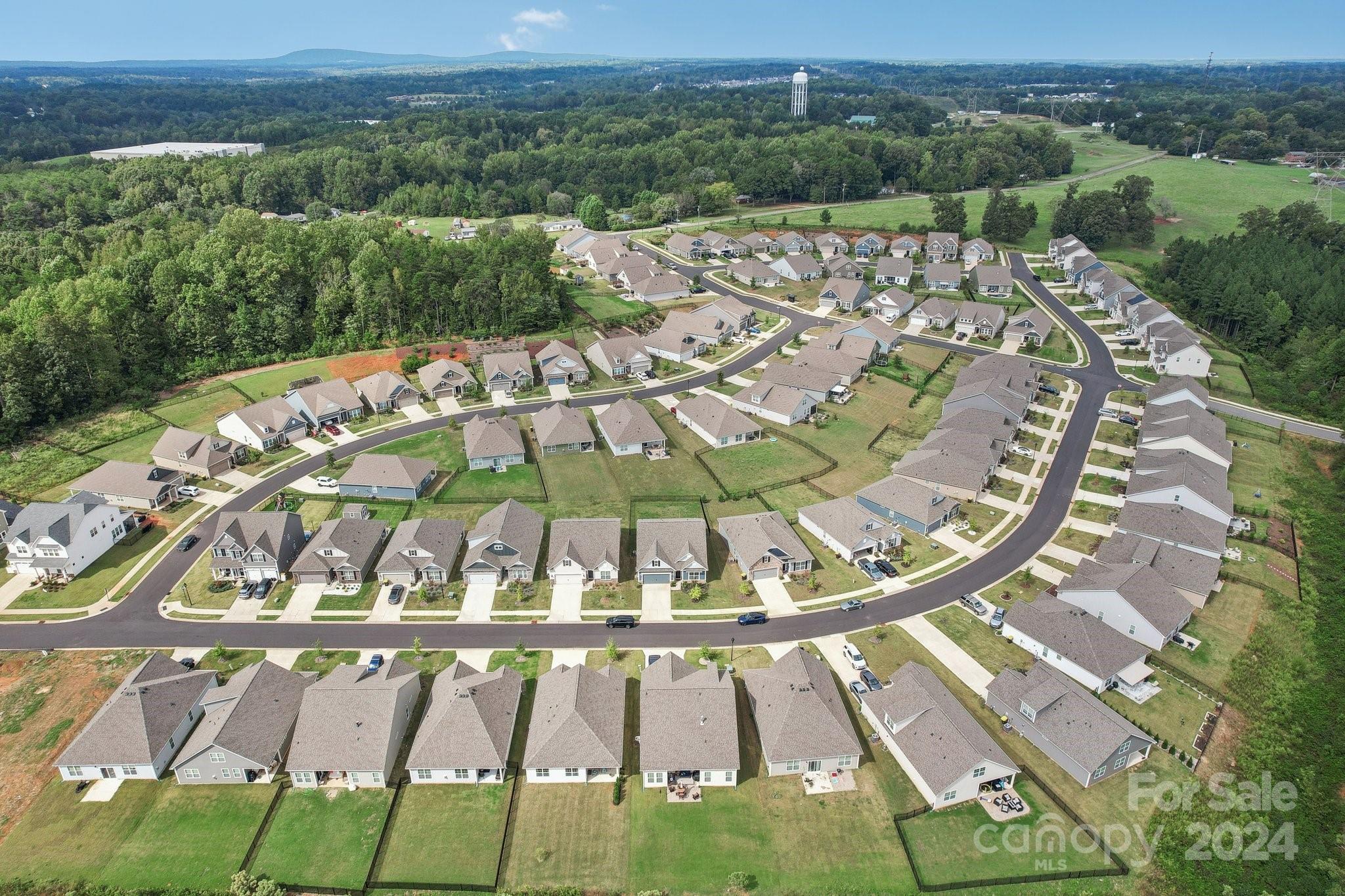 4203 Millstream Road Denver, NC 28037 - Photo 24 of 31 an aerial view of a swimming pool