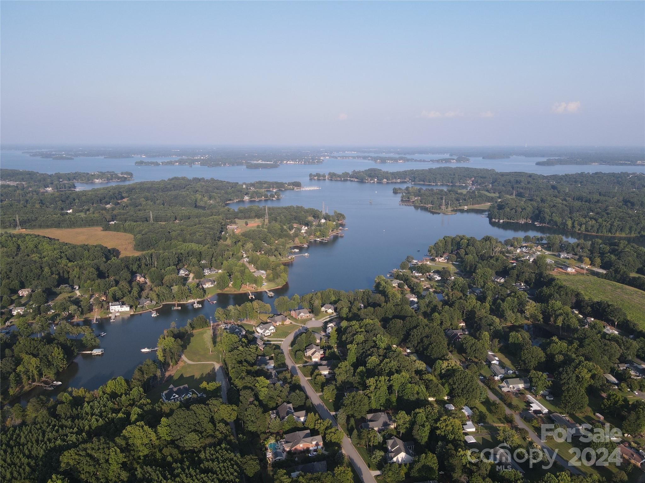 4203 Millstream Road Denver, NC 28037 - Photo 27 of 31 an aerial view of lake and residential houses with outdoor space
