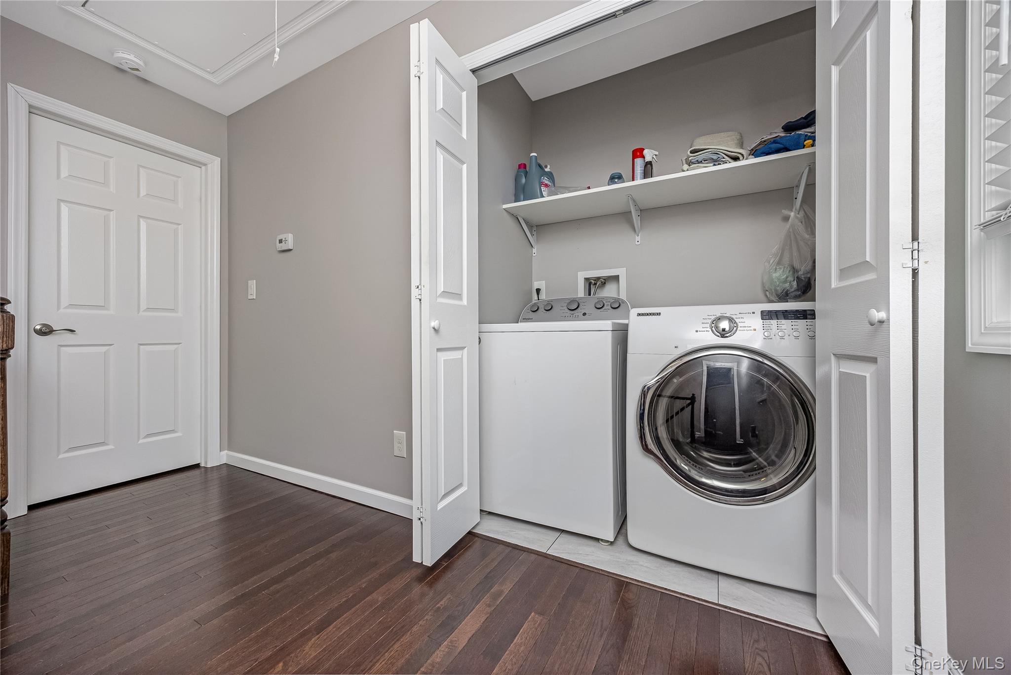 25 Cape Road Amityville, NY 11701 - Photo 18 of 30 a utility room with dryer and washer