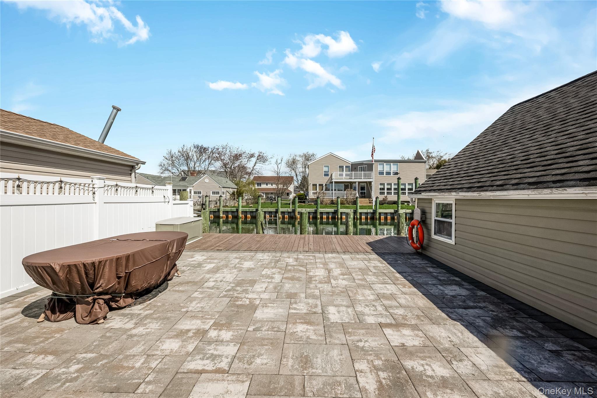 25 Cape Road Amityville, NY 11701 - Photo 20 of 30 a view of a terrace with chairs