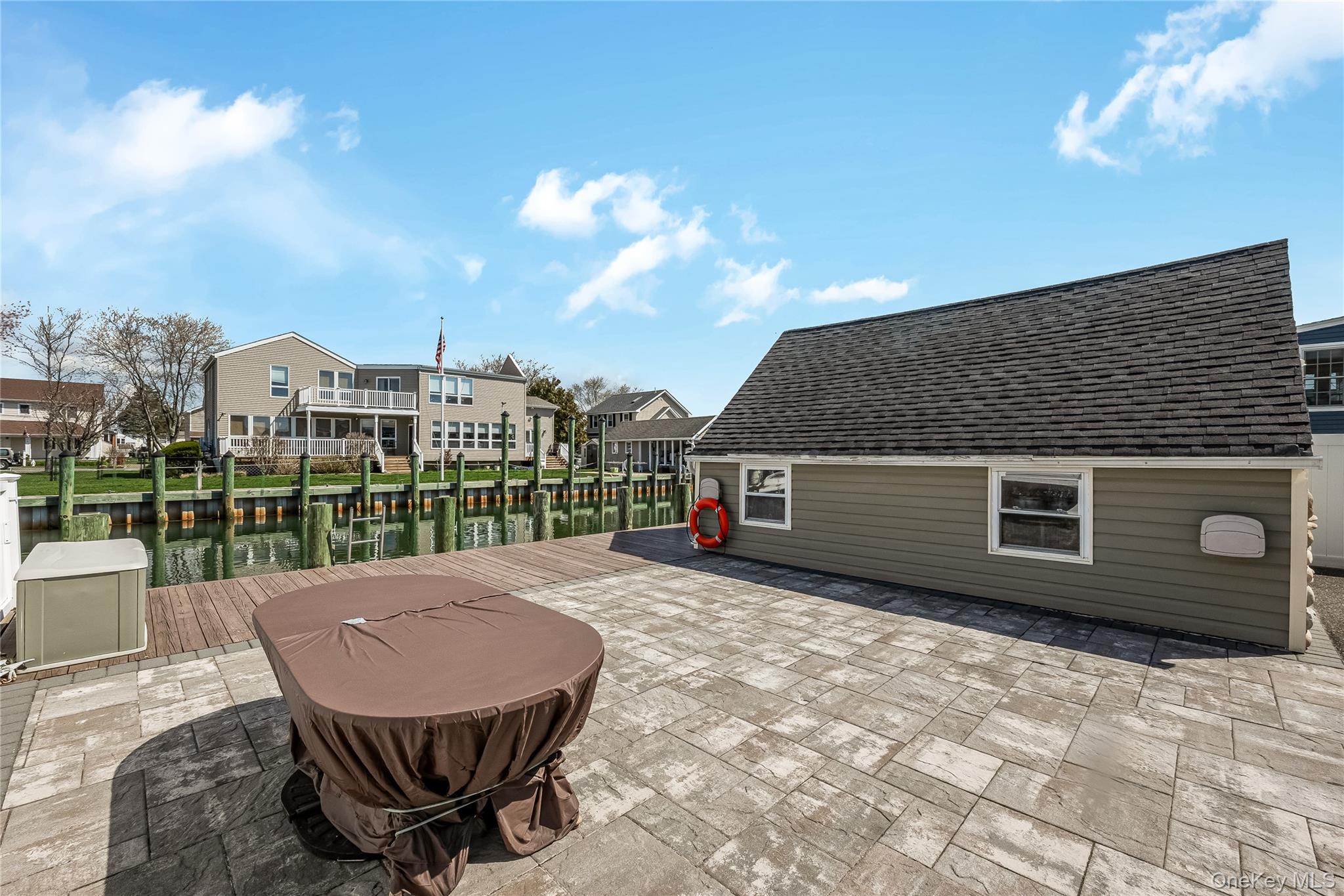 25 Cape Road Amityville, NY 11701 - Photo 21 of 30 a view of a chair and table in the terrace