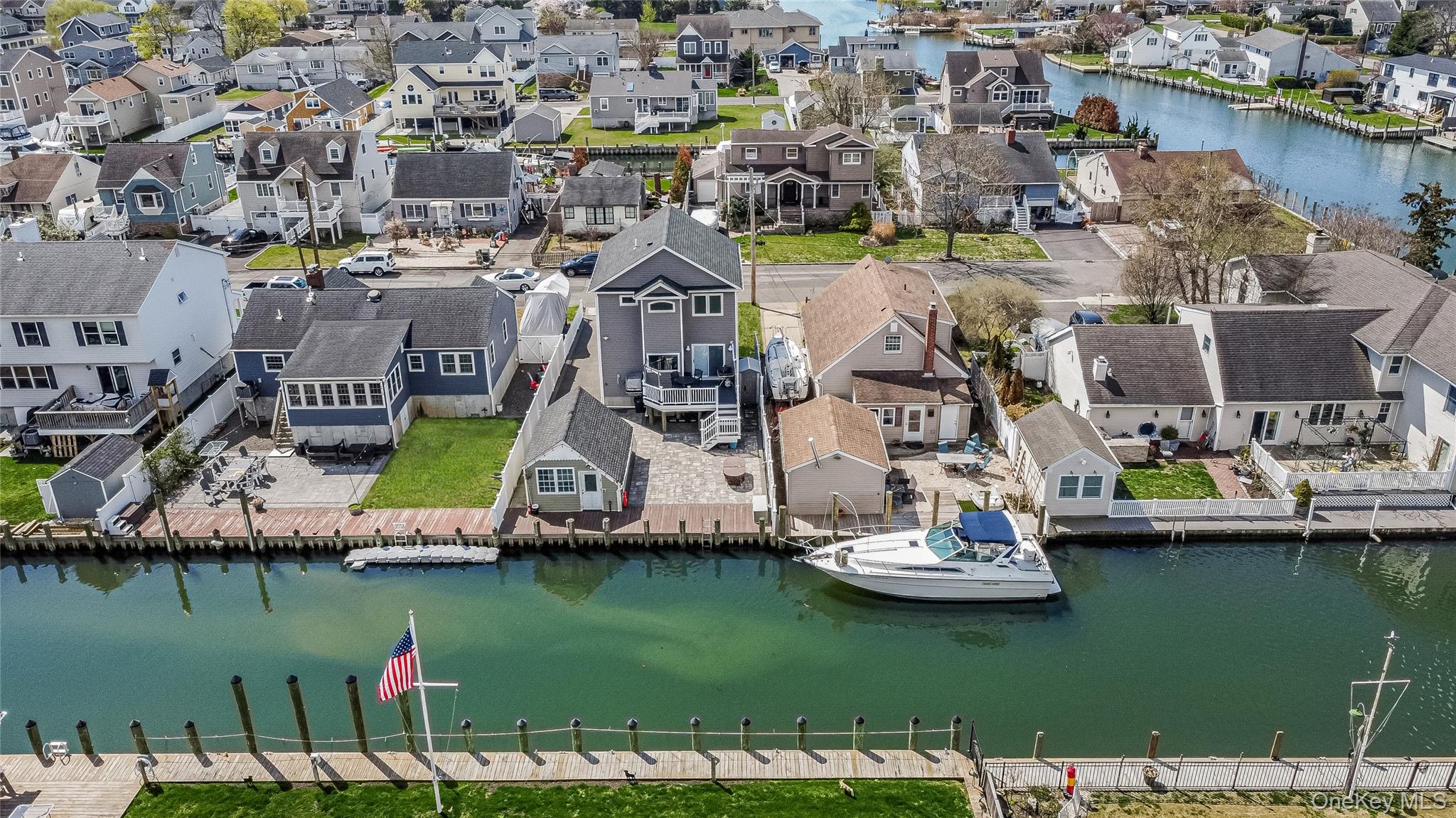 25 Cape Road Amityville, NY 11701 - Photo 29 of 30 an aerial view of a house with a lake view