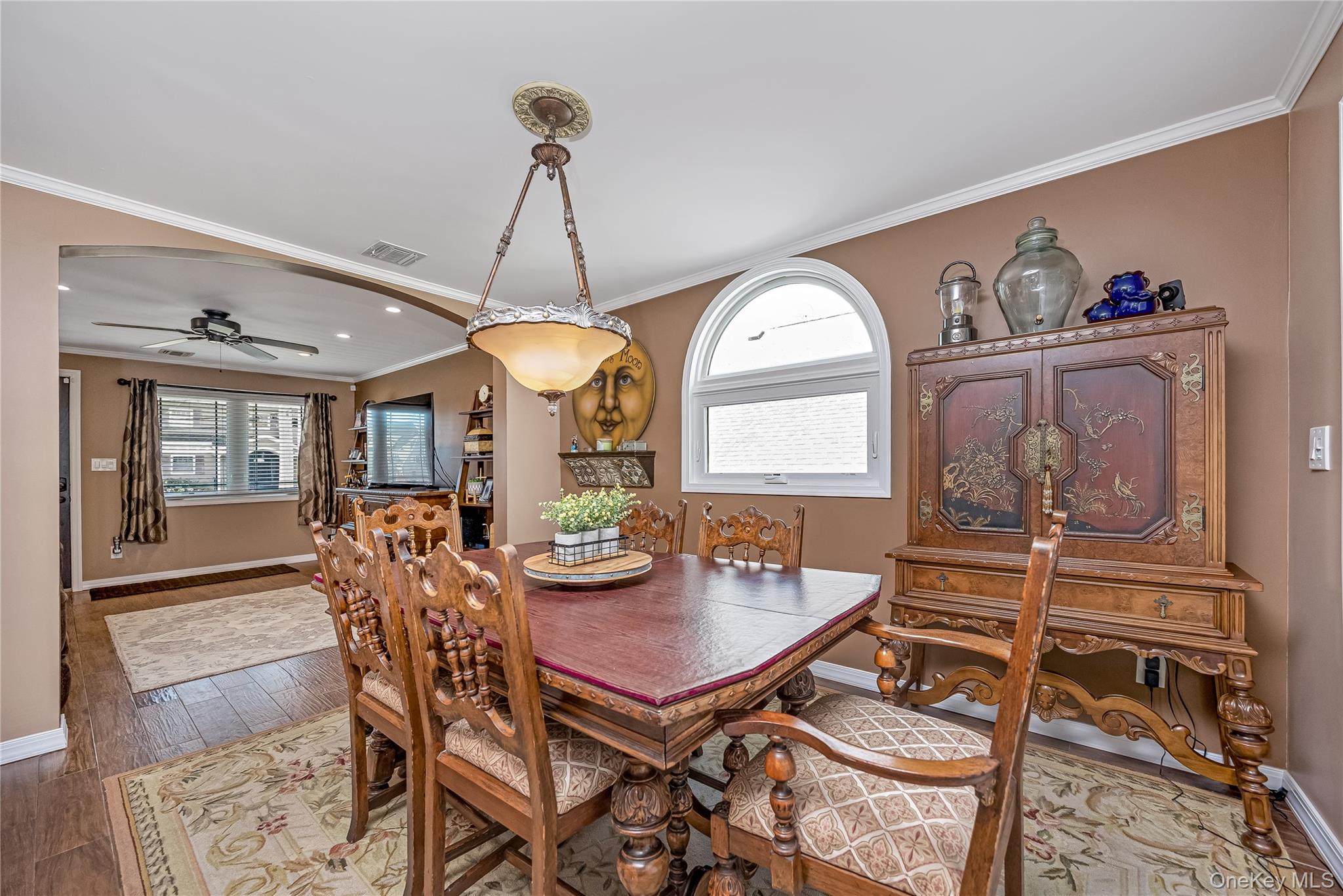 25 Cape Road Amityville, NY 11701 - Photo 9 of 30 a view of a dining room with furniture