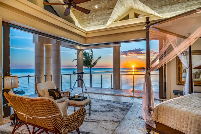 a bathroom with a granite countertop toilet sink and mirror