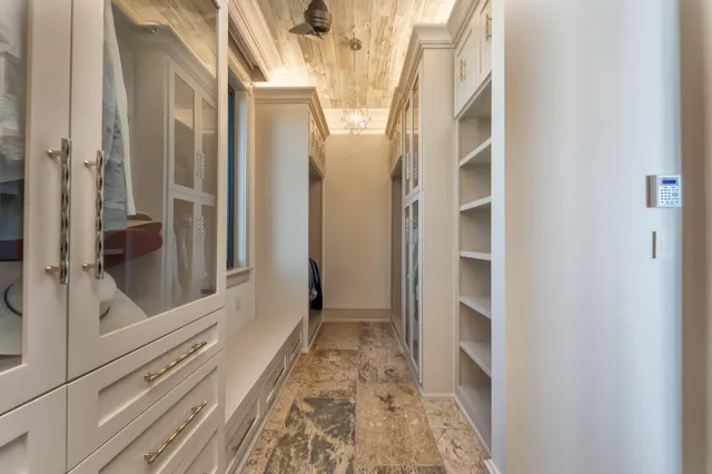 a view of swimming pool with outdoor seating and plants