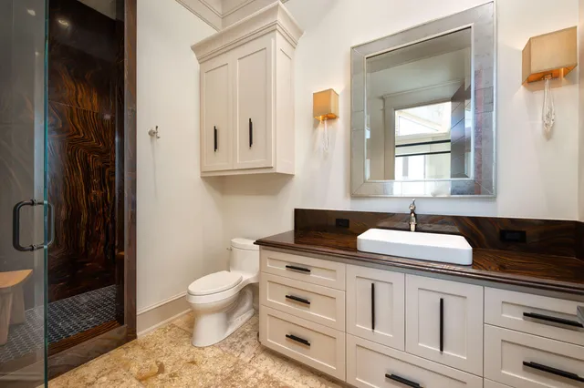 a view of a flower in front of a house