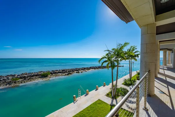 a view of a lake from a balcony