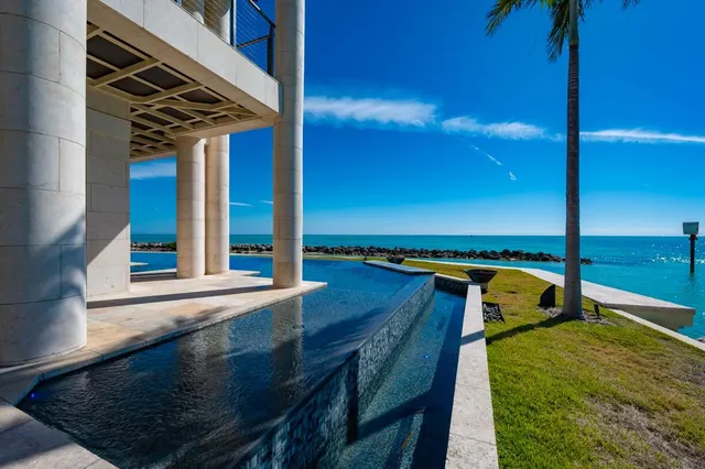 an aerial view of a house with a garden