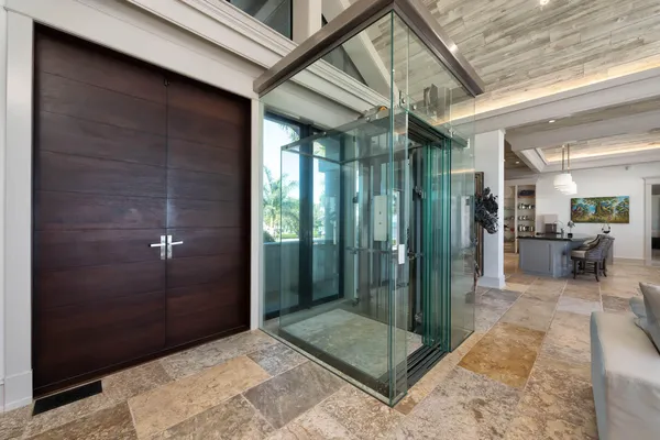 a kitchen with stainless steel appliances granite countertop a sink a stove and a counter space