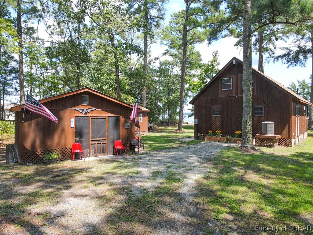 5447 Mobjack Road Gloucester, VA 23061 - Photo 27 of 40 View of yard with an outdoor structure