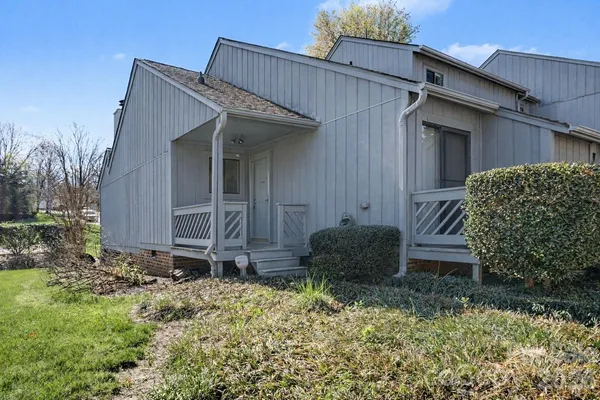 a view of a house with a garden