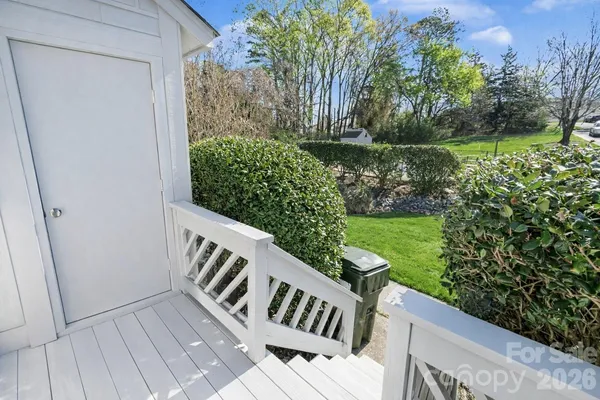 a view of deck and garden