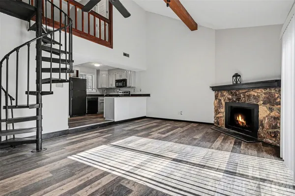 a view of a livingroom with a fireplace