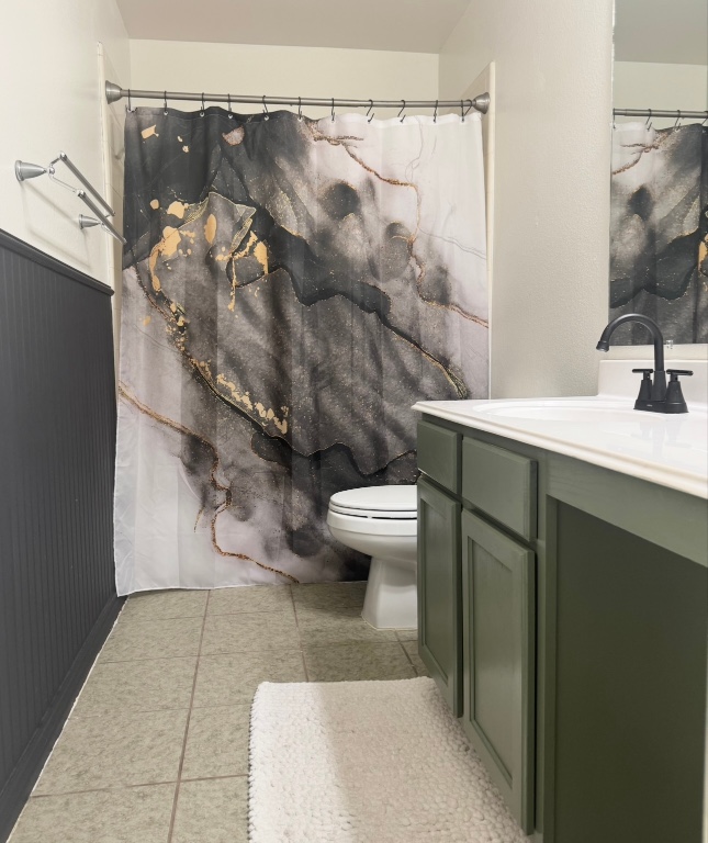 504 Chaparral Drive Leander, TX 78641 - Photo 20 of 34 a bathroom with a sink toilet and shower