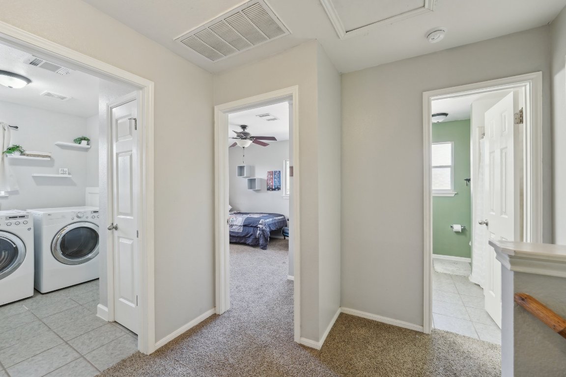 504 Chaparral Drive Leander, TX 78641 - Photo 21 of 34 a view of utility room and bedroom