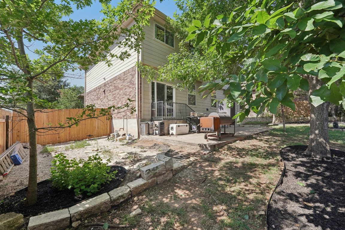 504 Chaparral Drive Leander, TX 78641 - Photo 32 of 34 a view of a backyard with sitting area