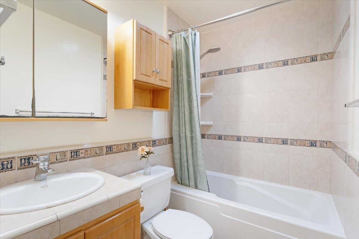 1415 Ruby Court, Unit 1 Capitola, CA 95010 - Photo 12 of 20 a bathroom with a sink toilet and shower