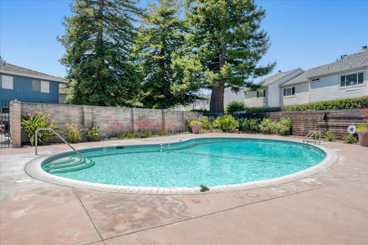 1415 Ruby Court, Unit 1 Capitola, CA 95010 - Photo 17 of 20 a view of outdoor space yard and swimming pool
